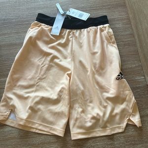 Adidas shorts, peach colored size extra small